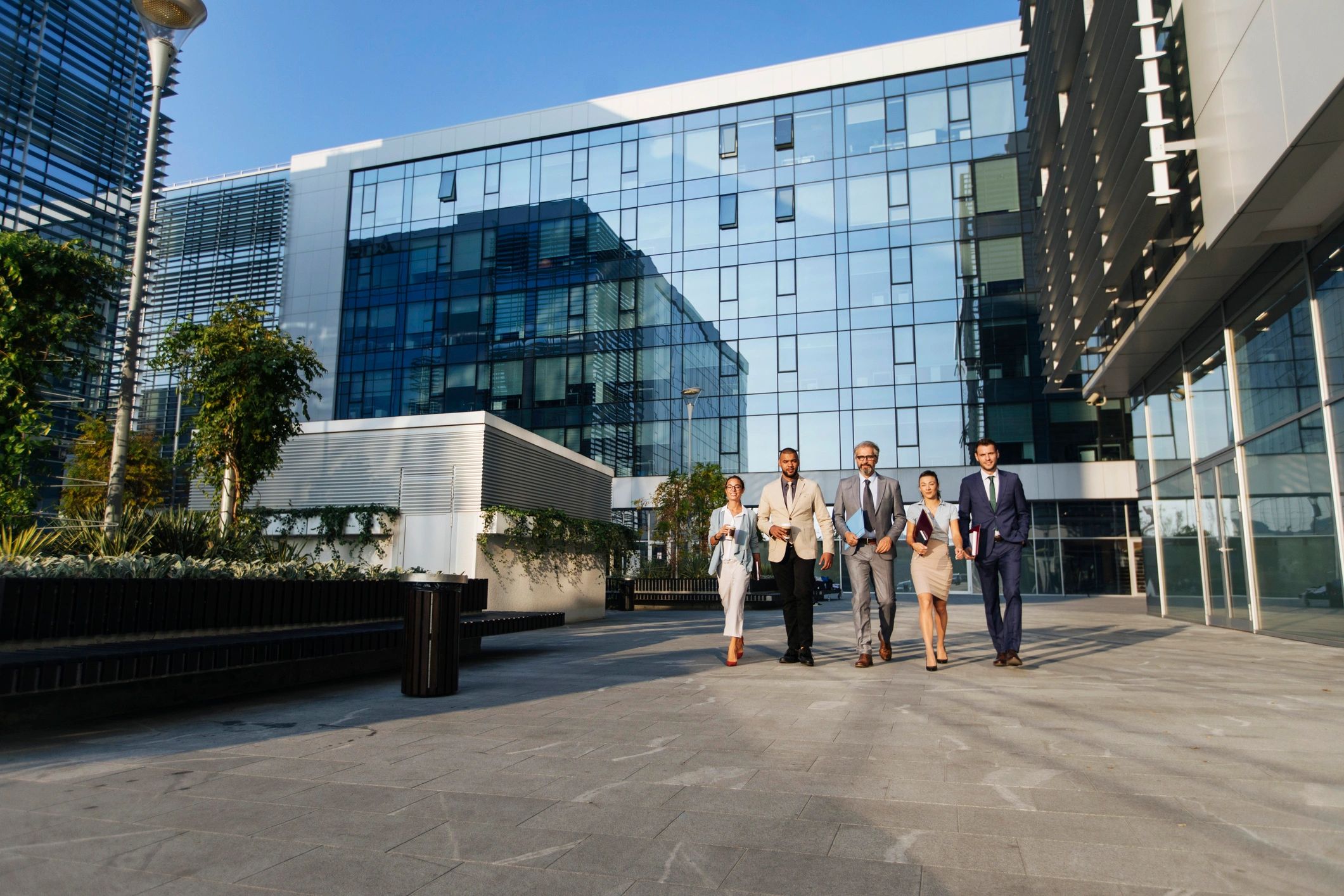Professional business consulting team collaborating in a modern office